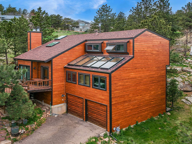 James Hardie redwood siding project on a beautiful home exterior